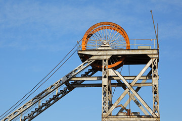 Old, disused mine shaft headgear with pulley wheel