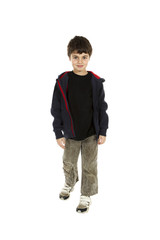 portrait of little boy standing on white background
