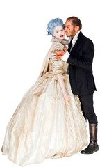 Male vampire embracing medieval woman