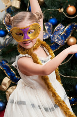 Little girl on masquerade