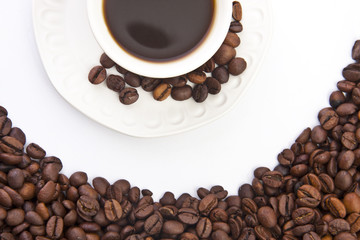taza de café con granos tostados