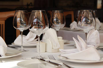 Empty glasses and plates on the table