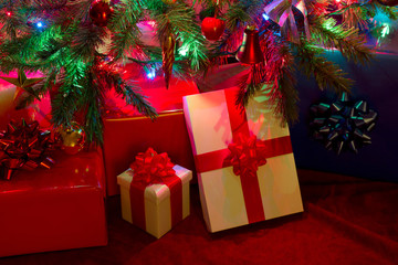 Fototapeta na wymiar gifts under christmas tree