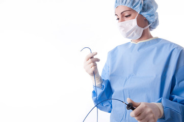Female doctor or nurse holding a catheter