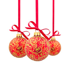 Three red Christmas balls in a row