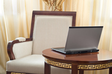 notebook (laptop) on a  home interior