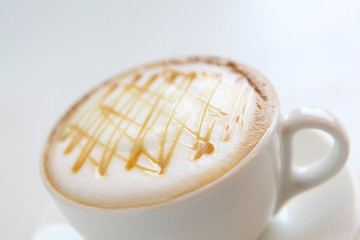 A cup of coffee with beautiful caramel