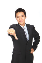 Business man's thumb down hand sign