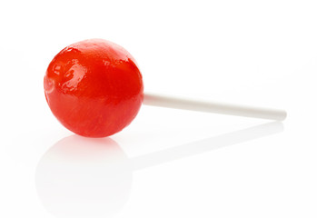 Red lollipop on white