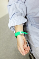 Patient hand before surgery in an operation room