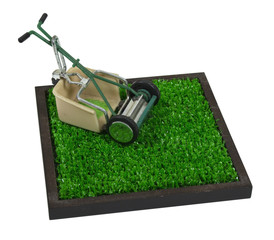 Fototapeta premium Retro Lawn Mower on the Grass