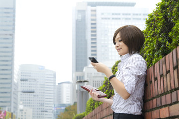 Asian woman using by smart phone