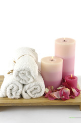Obraz na płótnie Canvas aromatherapy candle bottle of lavender massage oil