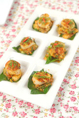 Scallops on a plate decorated