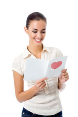 Young happy woman with valentine card, isolated