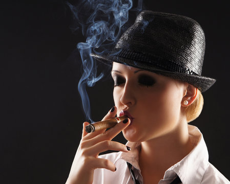 Young attractive female gangster