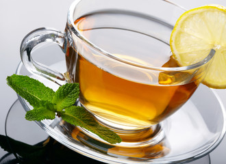 Cup of tea with lemon and mint