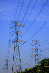 electric power line and tower on blue sky