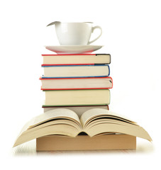 Composition with stack of books isolated on white
