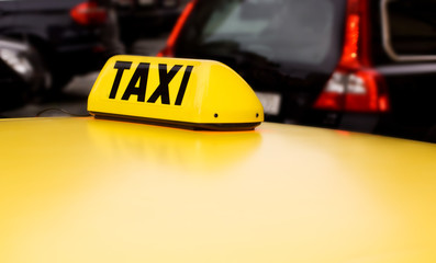 taxi sign yellow