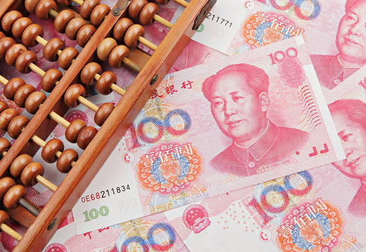 abacus and china money banknote