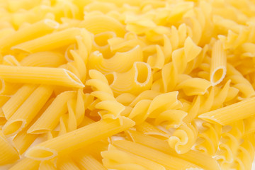 various shapes of uncooked pasta