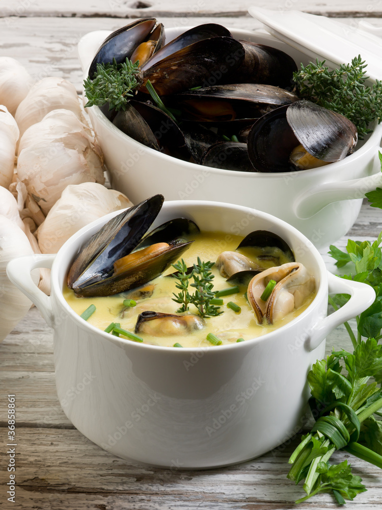 Wall mural mussel soup with saffron and cream sauce