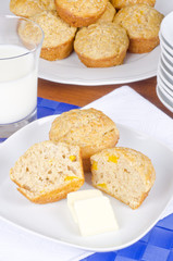 Homemade Peach Muffins Served with Butter and Milk