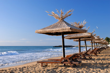 sunchairs and umbrellas on the beach