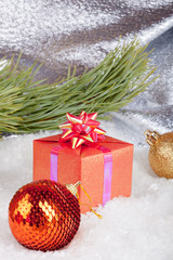 Fototapeta na wymiar Christmas ball and gifts