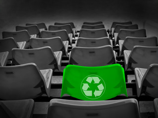 Bright green seat and recycle sign