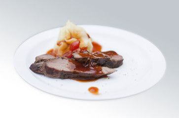 Deer sirloin, served with mashed potatoes with roasted garlic an