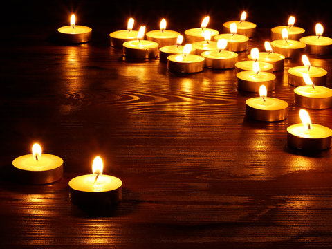 Group of  candles on  black background.