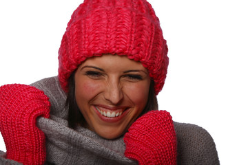 Junge, glückliche Frau in Winterkleidung
