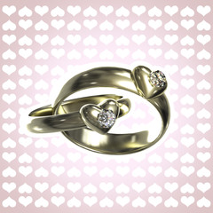 Two golden rings with hearts and diamonds