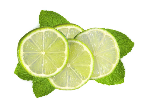 fresh slices lime with leaf mint isolated on white