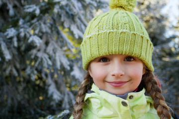 Frozen forest -Girl and trees coated with the hoar frost