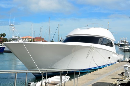 Fototapeta high speed yacht moored at marina in florida usa