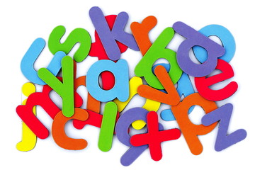Colorful alphabet scattered on white