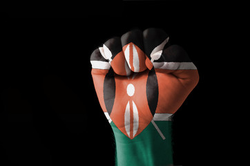 Fist painted in colors of kenya flag