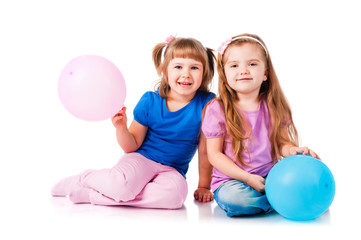 Fototapeta na wymiar two girls with balloons