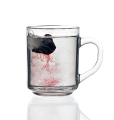 glass teacup with tea bag