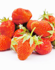 Large strawberries on a white background