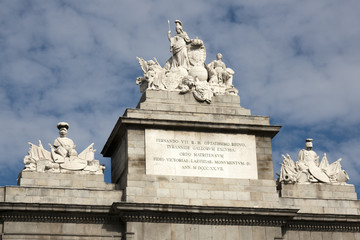 Fototapeta na wymiar Madrid - Puerta de Toledo detail: a group of sculptures sitting