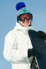 Happy sportsman with snowboards