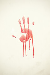 Bloody handprint on a wall during muslim festival of Eid