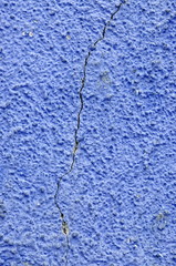 Crack in blue wall