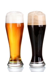 black and golden beer in glasses isolated on white