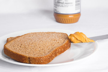 Preparation of Peanut Butter Sandwich on Whole Wheat