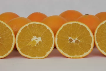 Abwaschbare Fototapete Obstscheiben Orangen